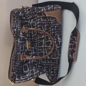 Nicole Miller overnight/gym bag Black and white with leopard lining! Beautiful!